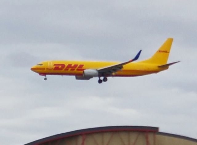 Boeing 737-800 (N737KT) - RARE catch of this SwiftAir 737-800F in full DHL livery landing LAX 25L on 10/25/20.