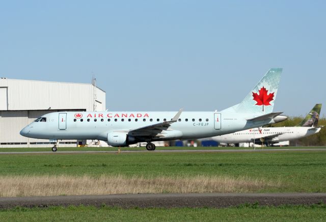 Embraer 175 (C-FEJP) - Leaving Ottawa on 4-May-13 for Toronto on rwy 25.