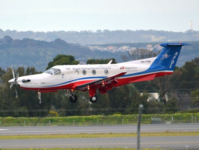 Pilatus PC-12 (VH-FVB) - About to put down on runway 05. Thursday 12th July 2012.