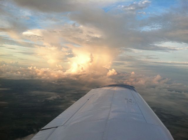 Piper Saratoga (N608TM) - Anvil cloud 50 off port side N.C.