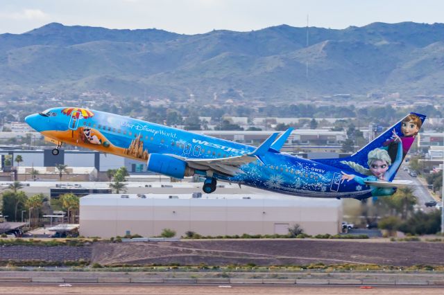 Boeing 737-800 (C-GWSV) - A WestJet 737-800 in Frozen special livery taking off from PHX on 2/13/23, the busiest day in PHX history, during the Super Bowl rush. Taken with a Canon R7 and Canon EF 100-400 II L lens.