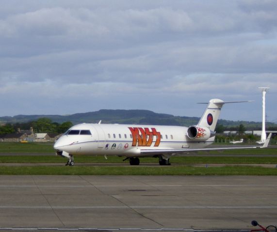 Canadair Regional Jet CRJ-200 (PH-AAG) - The band KISS were playing a gig at the SECC in Glasgow, shortly after this was taken the band left Glasgow Airport.