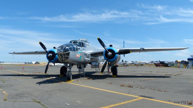 — — - B-25J 'Maid in the Shade' parked at Victoria Flying Club, July 2023