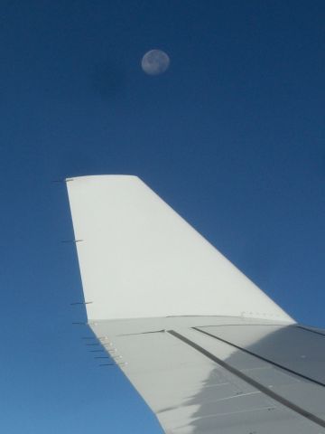 Airbus A330-300 — -  Sunrise/the setting moon over the Pacific approaching LAX from Auckland on a A330 on the morning of November 15, 2008