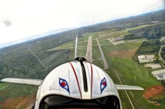 North American Trojan (N187GH) - A T-28 flown by Dan Serrato takes off on runway 13 at LaGrange Callaway Airport in LaGrange, Georgia with the photographer in the back doing a half-selfie.