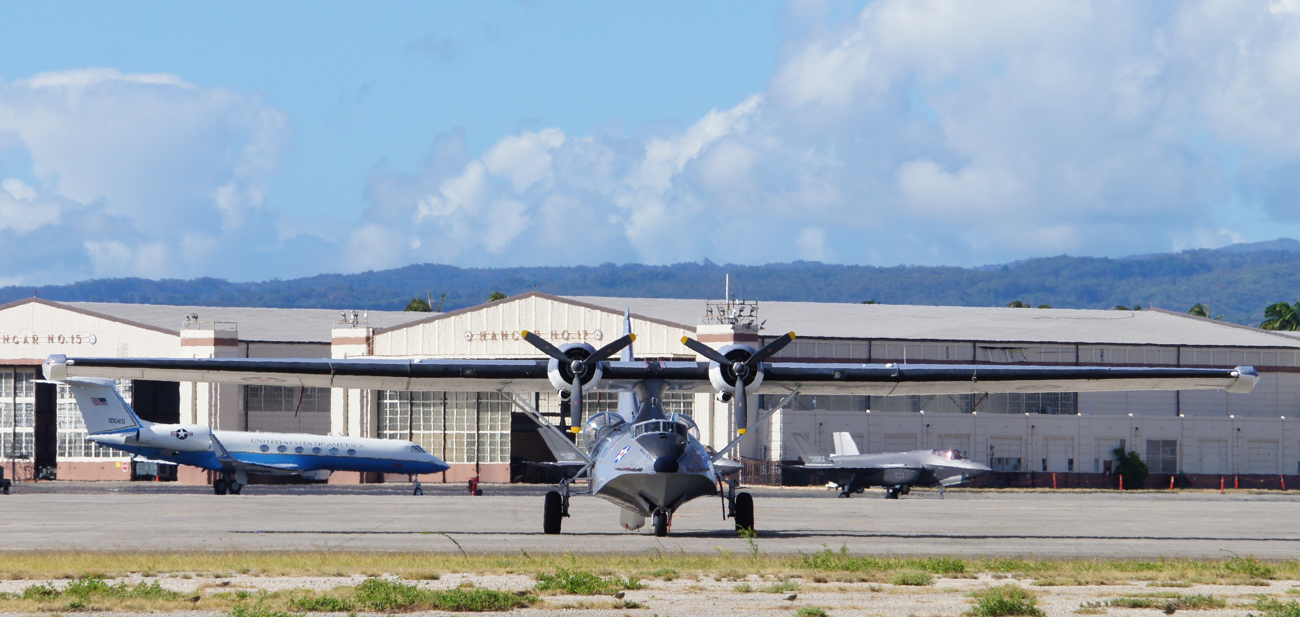 N9767 — - The distinctive and instantly recognizable shape of a PBY-5A named "Princess of the Stars" sits on the ramp at historic Hickam Air Base with a F-35 in the background.  "Princess of the Stars" was on O'ahu with 13 other warbirds to commemorate the 75th Anniversary of  VJ Day, conducting flyovers and more.  The daily sounds of her engines flying over my house for the past three weeks will be greatly missed.