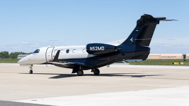 Embraer Phenom 300 (N52MD) - A Phenom 300 for Nicholas Air getting ready to stop on the ramp at KPPO.