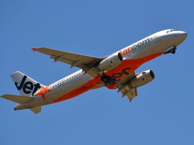 Airbus A320 (VH-VGN) - Getting airborne off runway 23. Wednesday 4th January 2012.