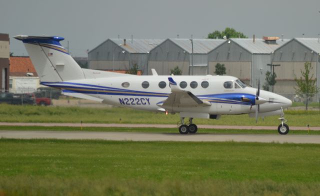 Beechcraft Super King Air 200 (N222CY) - N222CY departing Sioux Falls SD on Runway 15 on 6-12-15