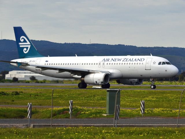 Airbus A320 (ZK-OJI) - On taxi-way heading for take off on runway 05, for flight home to Auckland, New Zealand. Thursday 12th July 2012.