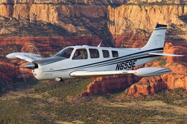 Beechcraft Bonanza (36) (N659E) - Air to air over Sedona AZ. Photo by Jay Beckman, br /T34 photo ship pilot was Tom Mitchell. G36 owner/pilot John Rippinger.