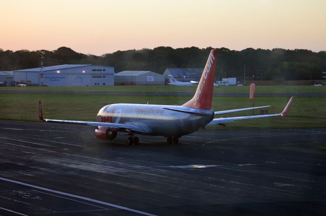 Boeing 737-800 (G-DRTZ) - Jet2 - B737-8ASWL (G-DRTZ) Jet2 early morning departure from NCL. (Photo taken behind window in "departure" lounge) (Photo Oct 2022)