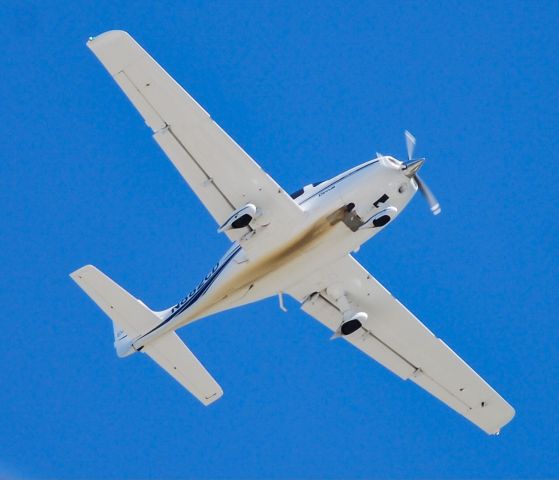 Cirrus SR-22 (N882CD) - On final to PGD.  8/6/21.