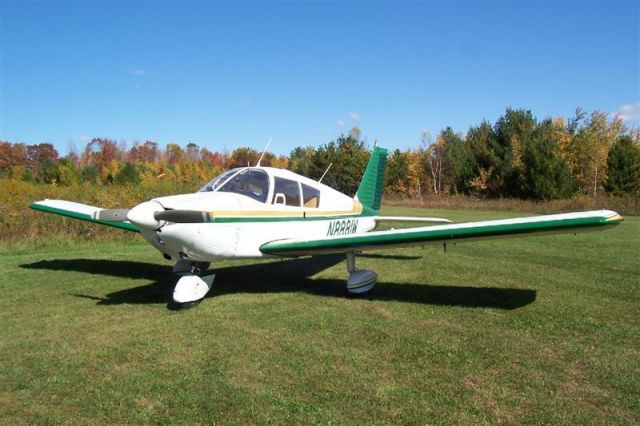 Piper Cherokee (N8881W) - 1964 Piper Cherokee 235 parked at Green Acres.  1200 Grass strip.  =)