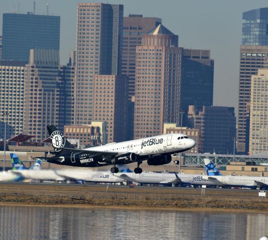 Airbus A320 (N633JB) - JetBlue 807 lifts off 4R with the Boston skyline as a backdrop 