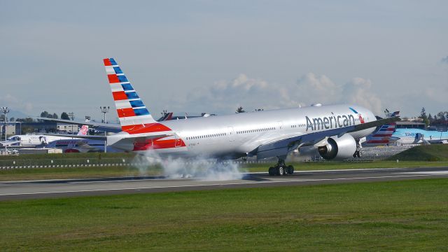 BOEING 777-300 (N734AR) - BOE318 lands on Rwy 16R to complete its C1 flight on 10/20/15. (ln 1344 / cn 31480).