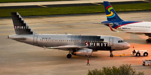 Airbus A319 (N507NK) - Early Bird pushing back before sunrise. Nikon D750, 70-200 lens, ISO 4500. 3/28/15.