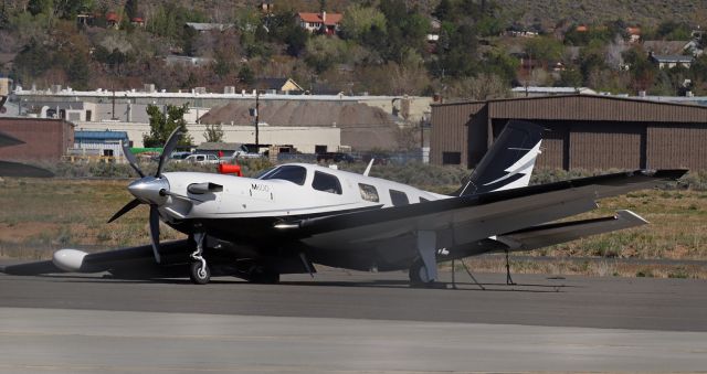 Piper Malibu Meridian — - Slid off the icey runway while landing back in January. Spun around 180 degrees and ended up with a wing still sticking out over the active. The pilot was not injured.br /The runway was immediately closed; however, a short time later a Cessna pilot did not catch the NOTAM advising of the closure and also did not see the Piper. The Cessna landed on the runway and collided with the Piper's wing. The wing of the Cessna was substantially damaged. The second pilot was also uninjured.