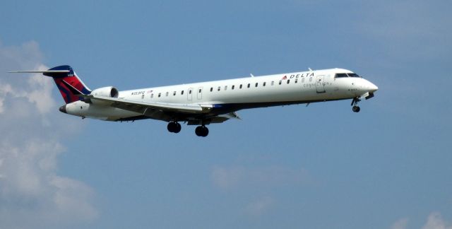 Canadair Regional Jet CRJ-900 (N153PQ) - On final is this 2007 Delta Airlines Connection Canadair Regional Jet 900LR in the Summer of 2021.