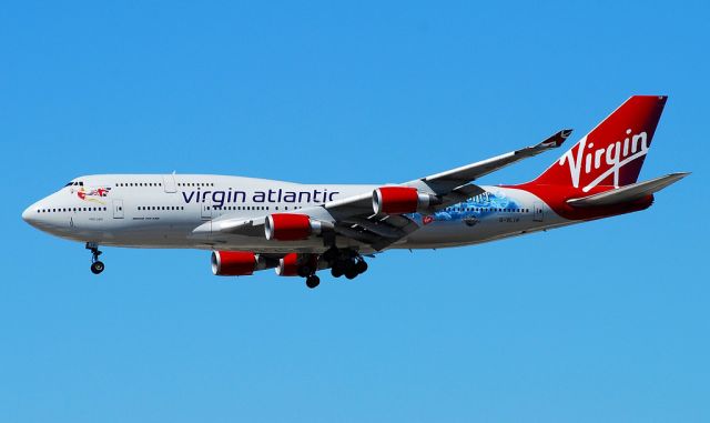 Boeing 747-400 (G-VLIP) - Virgin Atlantic Airways Boeing 747-443 G-VLIP (cn 32338/1274) "Hot Lips" VLIP now carrying the Wizarding World of Harry Potter special scheme!  Las Vegas - McCarran International (LAS / KLAS) USA - Nevada Photo: TDelCoro 8-19-2010