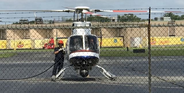 Bell 407 (N24NY) - LINDEN, NEW JERSEY, USA-AUGUST 26, 2019: Hot refueling of the NBC News helicopter at Linden Airport.