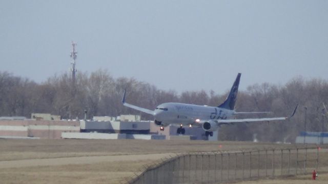 Boeing 737-800 (N3761R) - Delta 1502 arriving with a stiff cross wind from Tampa at 2:47 P.M.   Taken March 12, 2015.