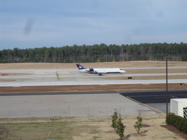 Canadair Regional Jet CRJ-200 (N427AW) - US Airways Express (N427AW) taxiing down the road to take off 23R at Raleigh (RDU) to Washington, DC (DCA) as Flight 885A.