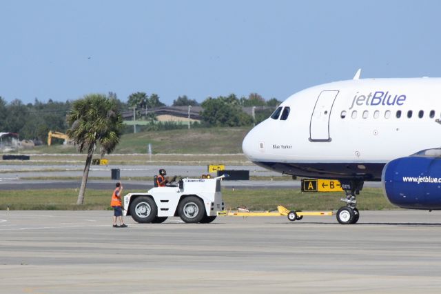 Airbus A320 (N605JB) - Jet Blue Flight 346 pushed back from the gate at Sarasota-Bradenton International Airport