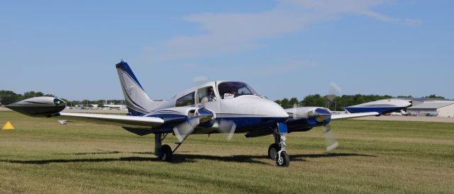 Cessna 310 (N66CW) - On flightline