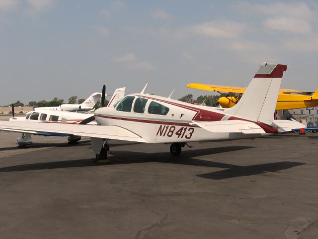 Beechcraft Bonanza (33) (N18413) - Parked at Santa Ana