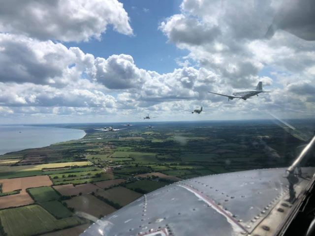 — — - The Normandy 75th Anniversary formation of C-47’s courtesy of Miss Montana.  