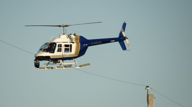 C-GXCH — - I was standing on Crescent Beach in Lunenburg County Nova Scotia. It was hovering over the beach.