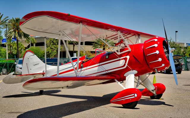 WACO O (N32005) - WACO UPF-7 built in 1941. Part of the lunch crowd at The Hangar Restaurant at Albert Whitted Field, St. Petersburg, Florida.
