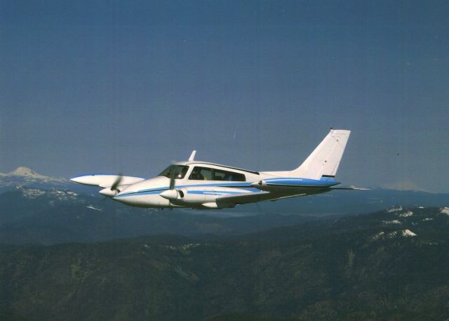 N7002L — - Northern California Mt Lassen on the left and Mt Shasta to the right of aircraft.