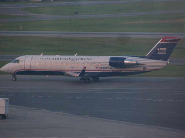 Canadair Regional Jet CRJ-200 (N444ZW) - A US Airways CRJ pulls into gate at KALB.