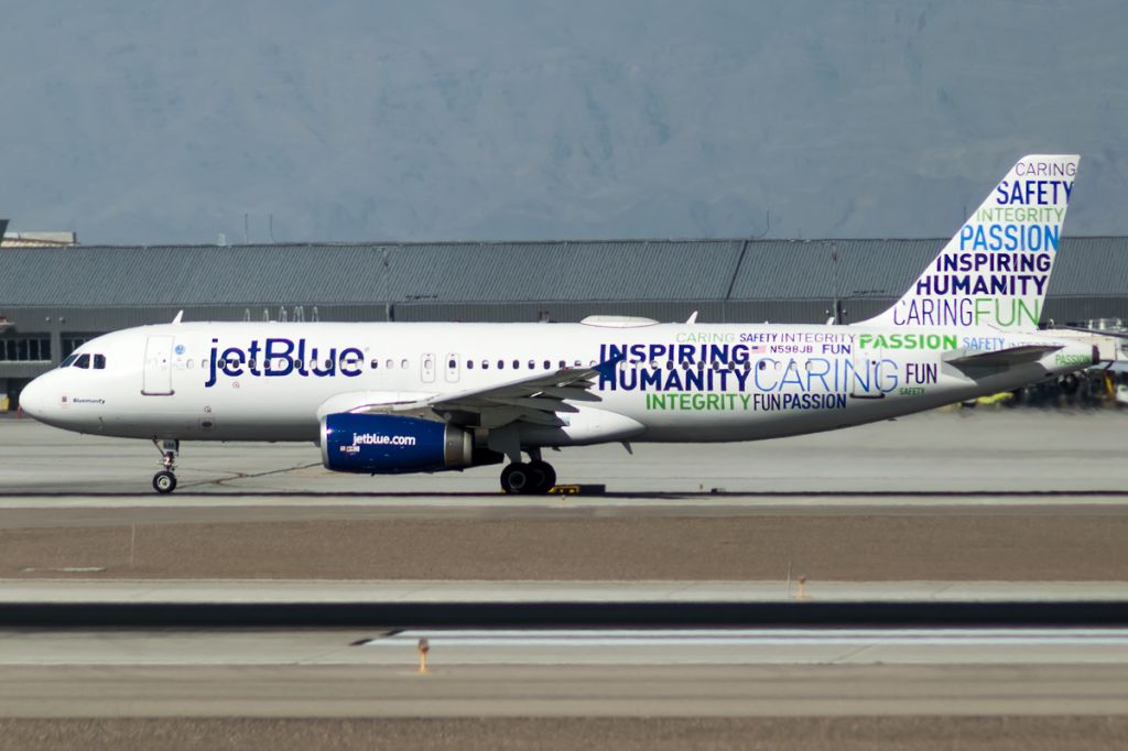 Airbus A320 (N598JB) - Bluemanity blasting away out of Las Vegas for its next flight