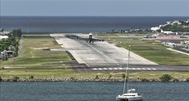 McDonnell Douglas DC-8-70 (OB2158P) - SkyBus Air Cargo 8233 DC87 departing St Maarten (TNCM) to Adams (BGI) 05/10/21