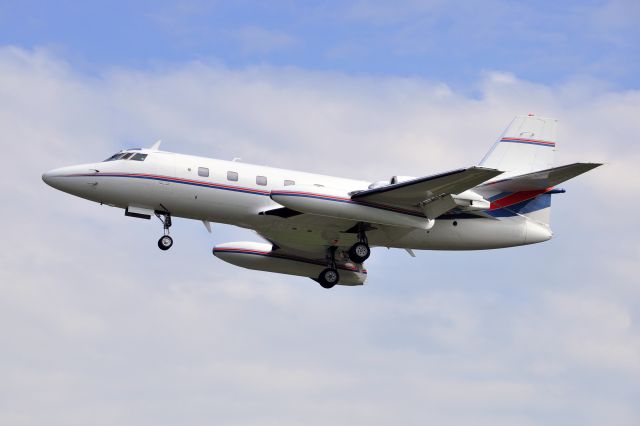 Lockheed Jetstar 2 (N77C) - N77C landing RWY 26 at the Lancaster Airport (LNS) in Lititz, Pennsylvania.