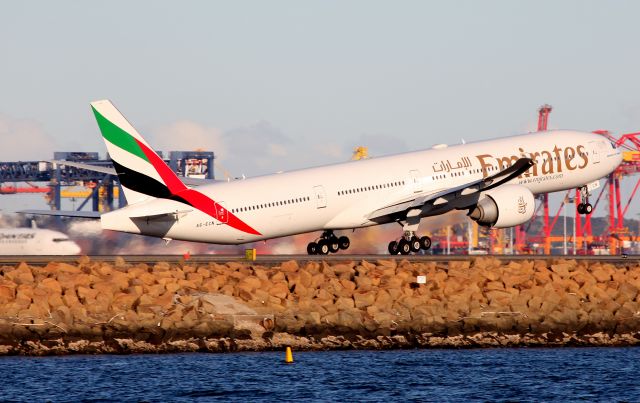 BOEING 777-300ER (A6-ECN) - Lifting Off From Rwy 16R