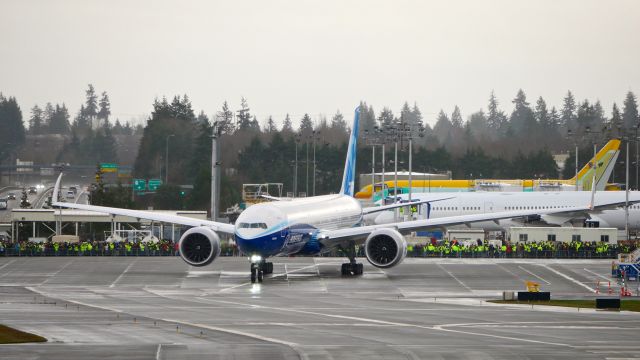 BOEING 777-9 (N779XW) - BOE001 taxis on the Boeing North ramp to a large crowd of Boeing employees and onlookers on 1.24.20. (ln 1567 / cn 64240). This was the second day of a hoped for maiden flight.