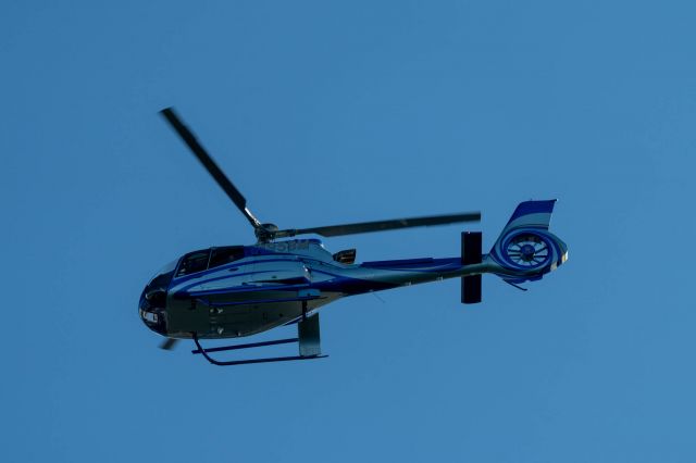 Eurocopter EC-130 (N1958M) - Sailing in Puget Sound when they flew over.