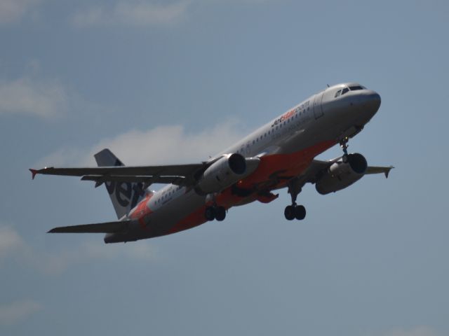 Airbus A320 (VH-VQX) - On taxi-way heading for Terminal 1, after landing on runway 23.