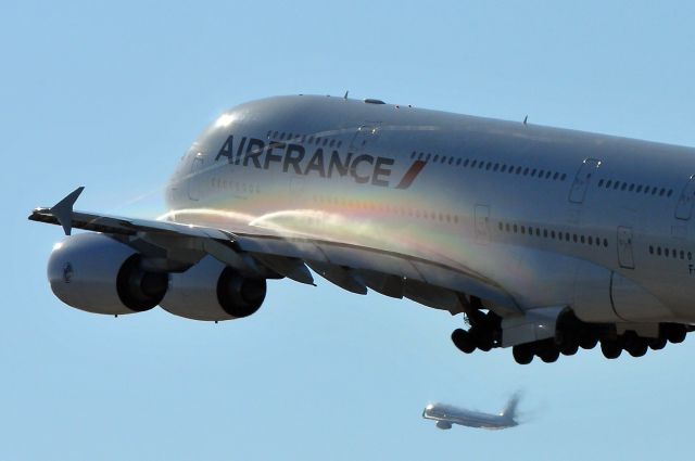 Airbus A380-800 (UNKNOWN) - A380 takeoff, 25L, August, 2012, taken from Sepulveda Hill.  AA 737-800, takeoff from 24L in background.