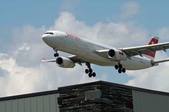 Airbus A330-300 (HB-JHI) - Arriving Montreal-Trudeau on runway 24R