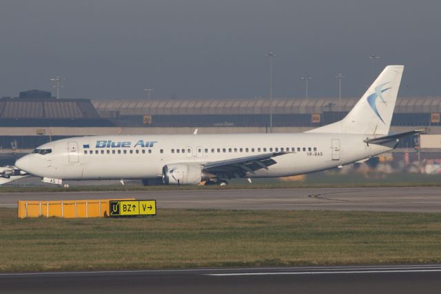 BOEING 737-400 (YR-BAS) - Diverting from the fog of Liverpool to the haze of Manchester.