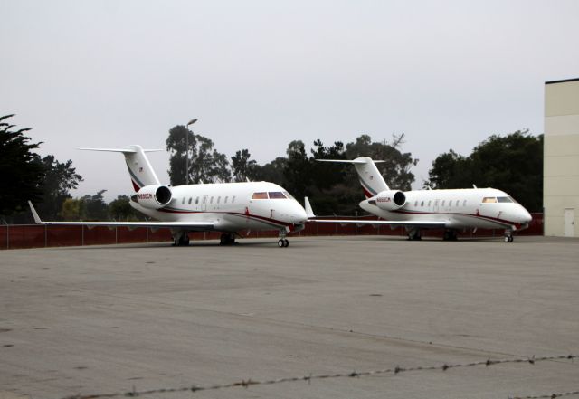 Canadair Challenger (N890CM) - KMRY - N890CM and N880CM sister ships at Monterey Jet Center - rare to see 2 Bizjets the same color scheme and close Reg side by side at the airport. Click full for large photo.