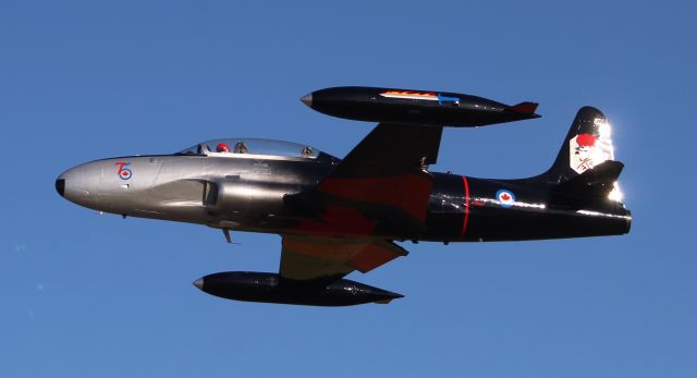 Lockheed T-33 Shooting Star (N133CN) - A 1953 model Canadair CT-133 Mark III Silver Star on a pass down Runway 1 at H.L Sonny Callahan Airport in Fairhope, AL during the Classic Jet Aircraft Association's 2020 JetBlast - March 6, 2020.