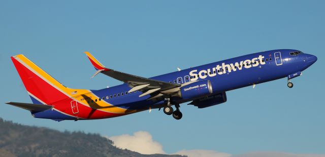 Boeing 737-800 (N8659D) - The shadow of the split scimitar winglet created by the angle of the early morning sun shows up perfectly on SWAs N8659D as it climbs away from runway 34L during a 7 AM departure from Reno Tahoe International.  This B738 is only 15 months old.  