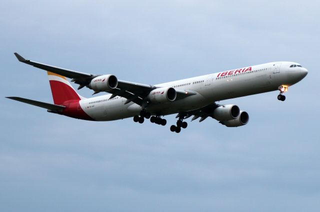 Airbus A340-600 (EC-JCZ) - 'Iberia 6165' from Madrid arriving from JFK after being diverted. Unable to land during a Logan ground stop due to severe thunderstorms and wind gusts, as well as a microburst, the pilot radioed they were unable to stay in an extended holding pattern due to 'bingo' fuel and needed to divert to JFK