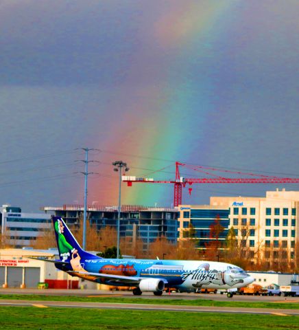 Boeing 737-700 (N705AS) - Taxiing out to 30R for a "Rainbow Departure"